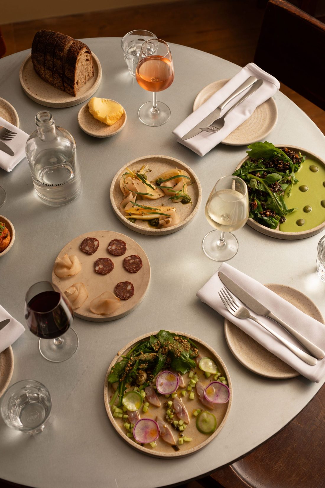 Snacks laid out on a zinc-topped table at Celentano&rsquo;s